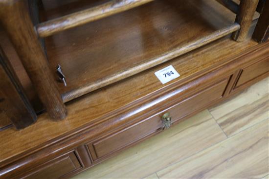 A low Chinese hardwood three drawer table, W.127cm